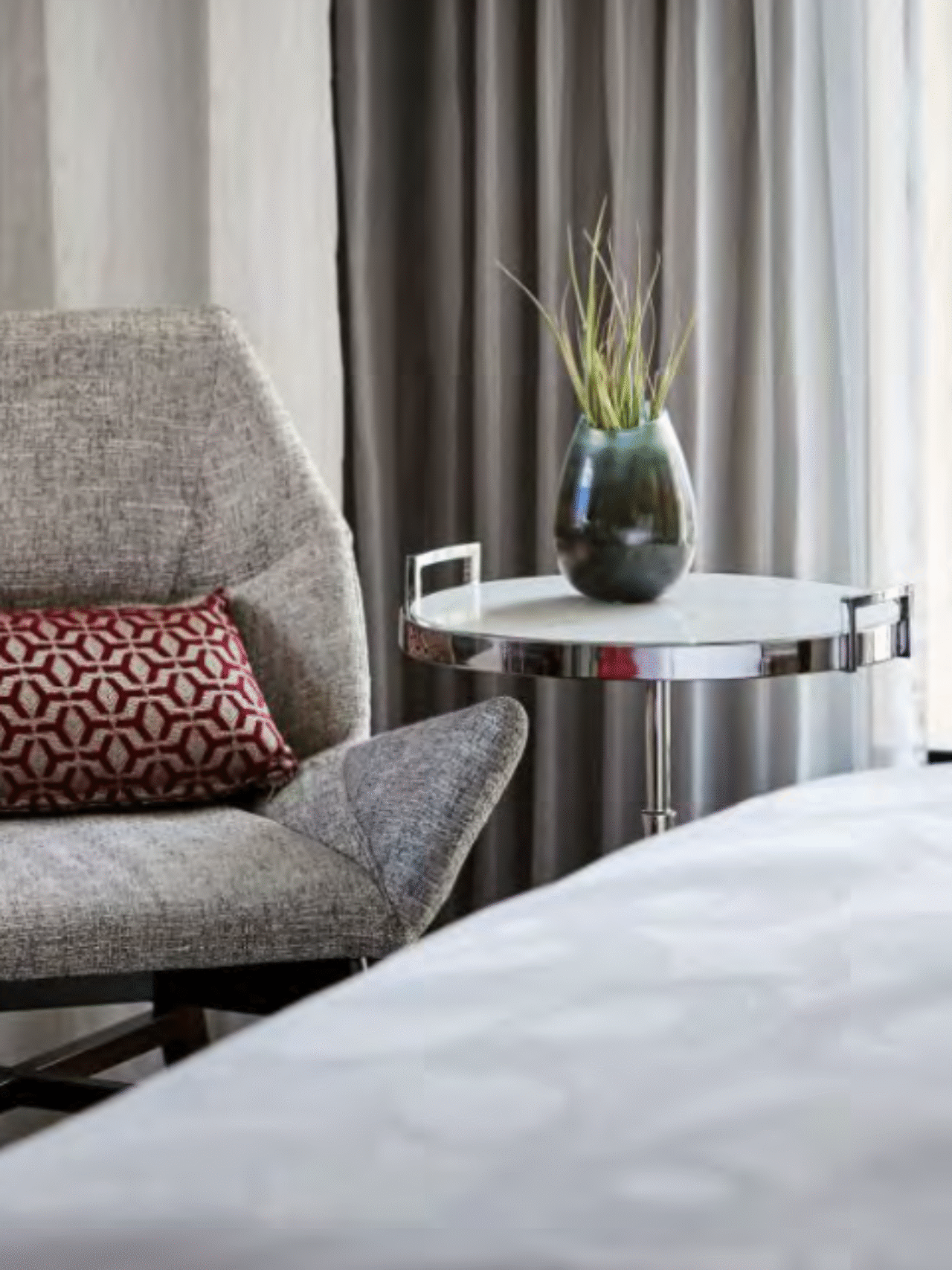 relaxing chair with side table and plant