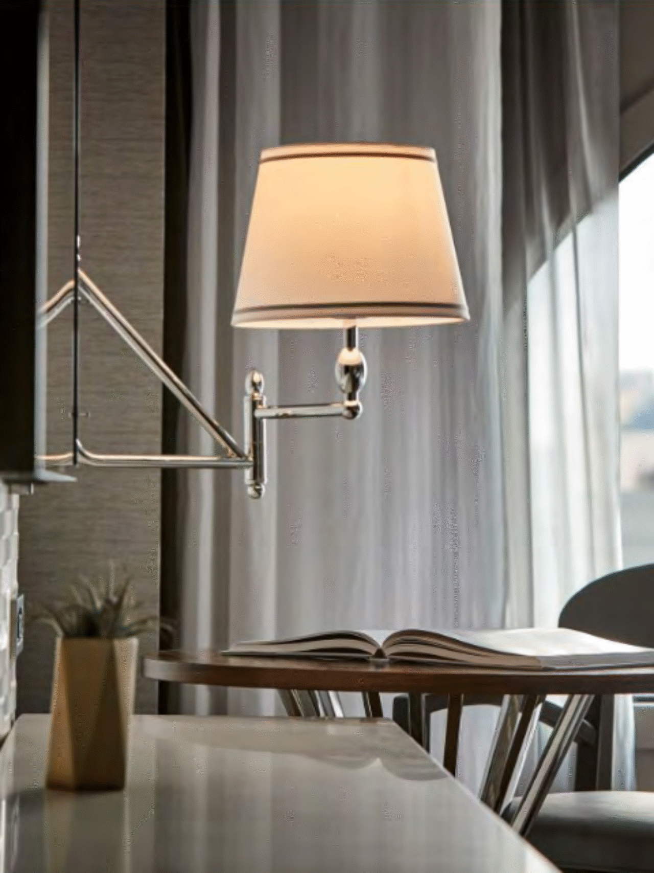 lamp at desk with an open book
